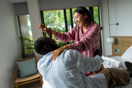 Happy diverse couple enjoying meaningful moments together, embracing love, connection, and joyの写真素材