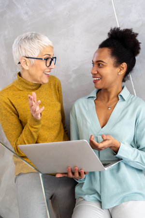 Teamwork with laptops for future solutionsの写真素材