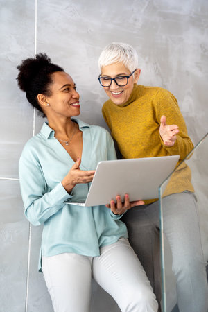 Business people with laptop, innovation in research and programming for future app technologyの写真素材