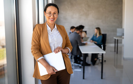 Team of programmers working together in an officeの写真素材