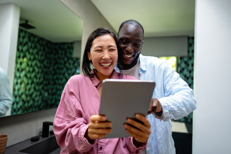 Online entertainment and social media. Couple enjoying the digital world, staying connected onlineの写真素材
