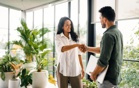 Success group of multiethnic entrepreneurs and business people achieving goals in corporate officeの写真素材