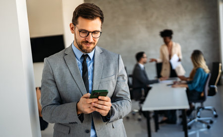 A confident businessman leads in corporate culture, business growth, and global financeの写真素材