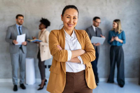 Successful happy Asian diverse business woman, startup coworker or software programmer engineerの写真素材