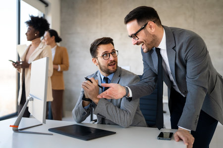 CEO executive manager mentor giving consultation on financial operations to colleagueの写真素材