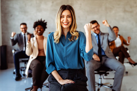 Professional in office environment, highlighting teamwork, collaboration, leadership, and innovationの写真素材