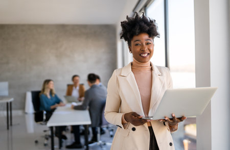 Successful happy diverse business woman, startup coworker or software programmer engineerの写真素材