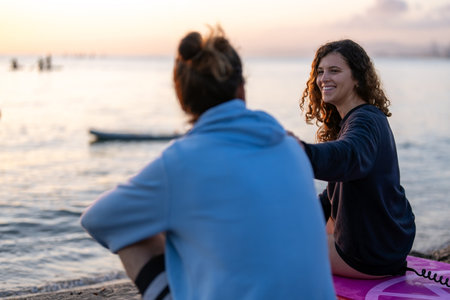 Young people having fun, enjoying their vacations outdoors at the beach with surfboards. Sport, surfの写真素材