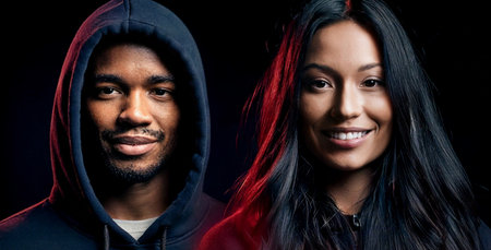 Portrait of a young African American couple in a hooded sweatshirtの素材