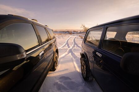 Moscow, Russia - January 26, 2014: Great Wall Hover H3 off-road car Lada Niva and Chinese SUVのeditorial素材