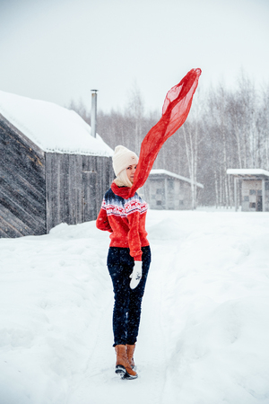 A beautiful girl in winter wind.の写真素材