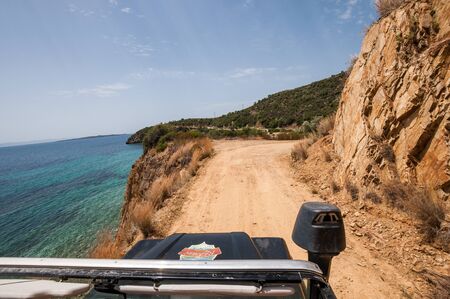Sithonia, Chalkidiki, Greece - June 27, 2014: Land Rover Defender 110 driving on the off-roadのeditorial素材