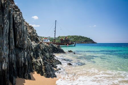 Neos Marmaras, Halkidiki, Greece - June 29, 2014: Tourist ship near the island in good sunny weather.のeditorial素材