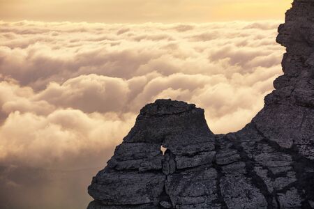 Clouds and rocks. Mountain range Demerdzhi, the Republic of Crimea.