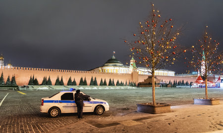 Moscow, Russia - December 30, 2020: Police guarding Red Square and the Kremlin on a cold winter night.のeditorial素材