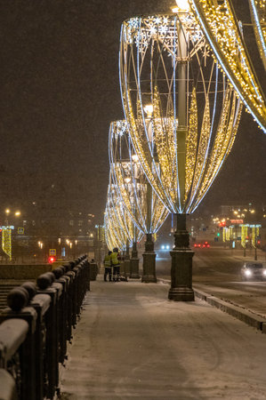 Moscow, Russia - December 27, 2022: Cold and deserted Moscow street on a snowy winter eveningの写真素材