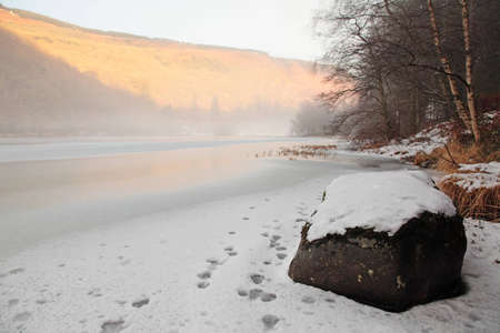 A frozen lake in Scotlandの写真素材