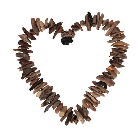 A loveheart made of drifwoodの写真素材