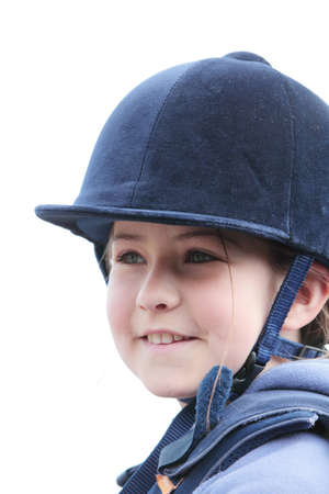 A pretty girl in a riding helmetの写真素材