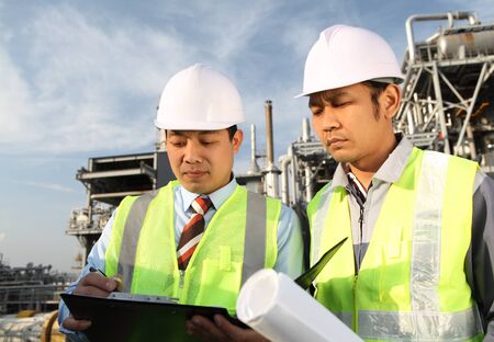 two engineer discussing a new projectの写真素材