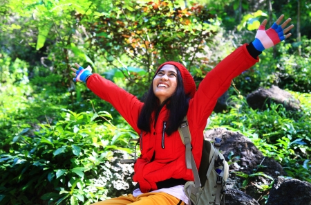 Woman backpacker on springの写真素材