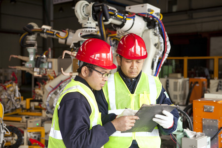Factory team work on discussingの写真素材
