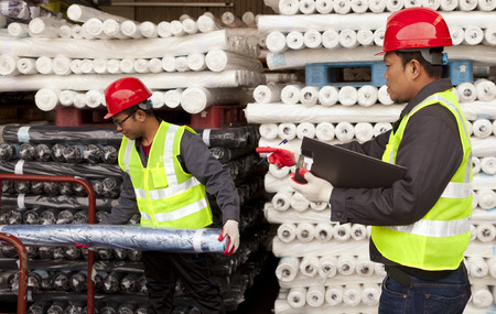 Textile factory workers on working  の写真素材