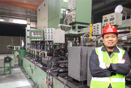 Engineer in front of machineの写真素材
