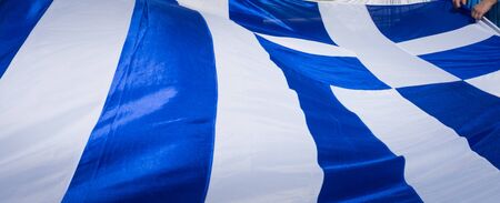greek flag wavingの写真素材