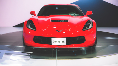 HO CHI MINH / VIETNAM, 04 AUG 2017 - Beauty Model and Red Chevrolet Corvette car on display at Vietnam Motor Show 2017のeditorial素材