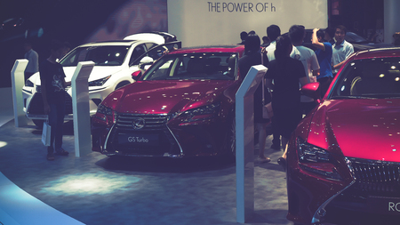HO CHI MINH / VIETNAM, 04 AUG 2017 - Beauty Model and Lexus RC Turbo car on display at Vietnam motor Show 2017のeditorial素材