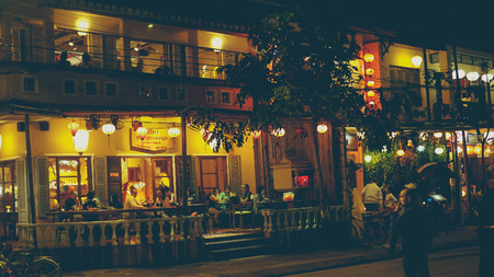 Tourists in a restaurant in Hoi An Ancient Town at nightのeditorial素材