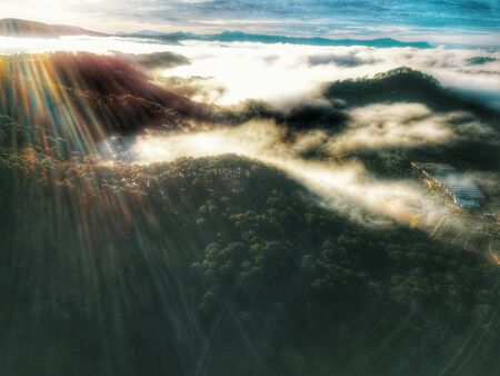 Foggy Mountains and beautiful sunrise in Da Lat