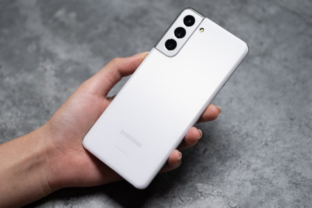 Apple iPhone 12 Pro smartphone in hand.のeditorial素材