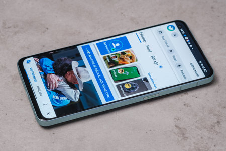 Google Play Store application on a smartphone screen. Google Play Store is a free-to-play web browser developed by Google Inc.のeditorial素材