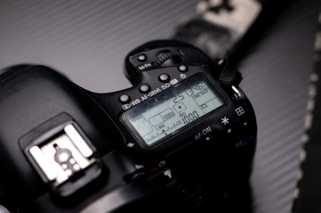 Digital SLR camera on a black background. Close-up.のeditorial素材