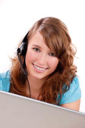 Portrait of a young gorgeous telephone worker smiling. Isolated on a white background. 