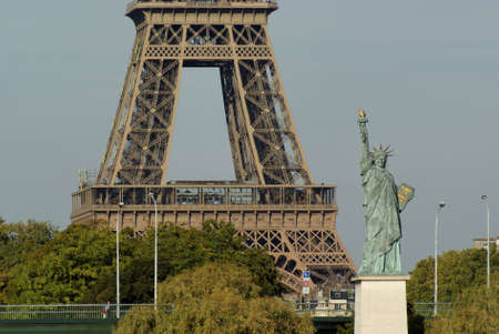 The small Statue of Liberty near the Eiffel tower in Paris, as seen from opposite bankの写真素材