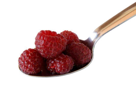 Serving raspberries on a spoon (background removed)の写真素材