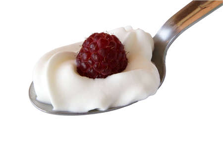 Serving raspberry over whipped cream on a spoon (background removed)の写真素材