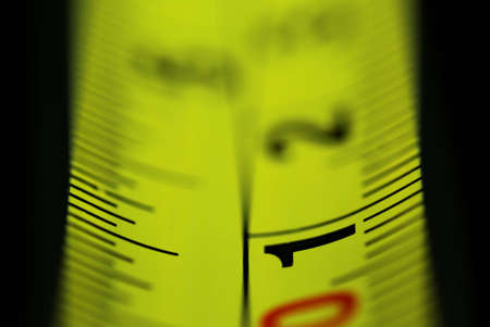 Macro view and very shallow DOF of a measurement tape. Concept for lack of visibility, short sight...