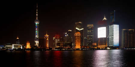 Modern Pudong district in Shanghai at night (logos removed)の写真素材