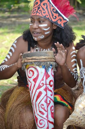 Travel Photography of Travel Photography of local people from Raja Ampat, Papua, Indonesia performing traditional art and cultural dance. のeditorial素材
