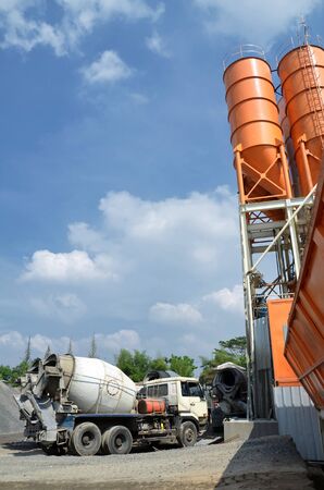 Truck lining up at Industrial Cement silo yardのeditorial素材