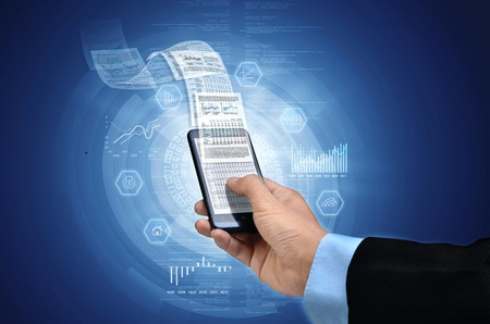 Businessman reading business or financial report on smart phone concept via internet connectionの写真素材