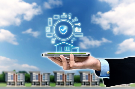 Internet of things and smart home concept. Controlling everything with a smart phone or gadget using application.の写真素材