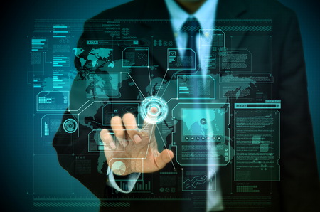 Businessman accessing a global worldwide business information on a virtual internet screen