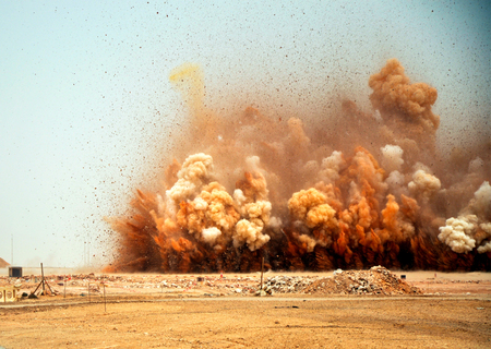 pre-programmed electric delayed detonators.