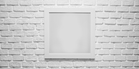 blank paper frames on white brick wall in 2:1 ratioの写真素材