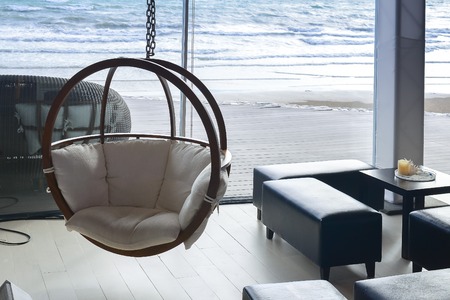 house near beach decoration with hanging chair